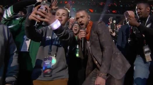 No shame: This kid had real guts to take a selfie with JT mid-performance. Source: NBC