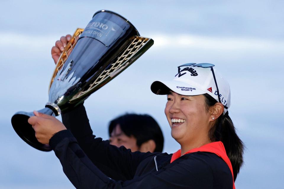 Rose Zhang holds up the trophy after winning the Mizuho Americas Open (AP)