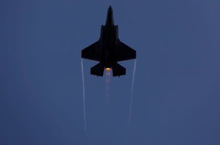 FILE PHOTO: An Israeli Air Force F-35 fighter jet flies during an aerial demonstration at a graduation ceremony for Israeli air force pilots at the Hatzerim air base in southern Israel December 29, 2016.  REUTERS/Amir Cohen/File Photo