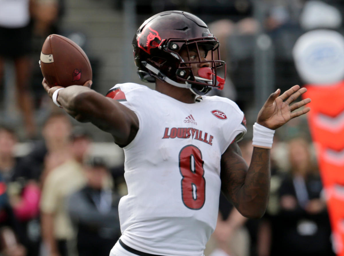 Lamar Jackson puts Louisville jersey back on for Heisman House