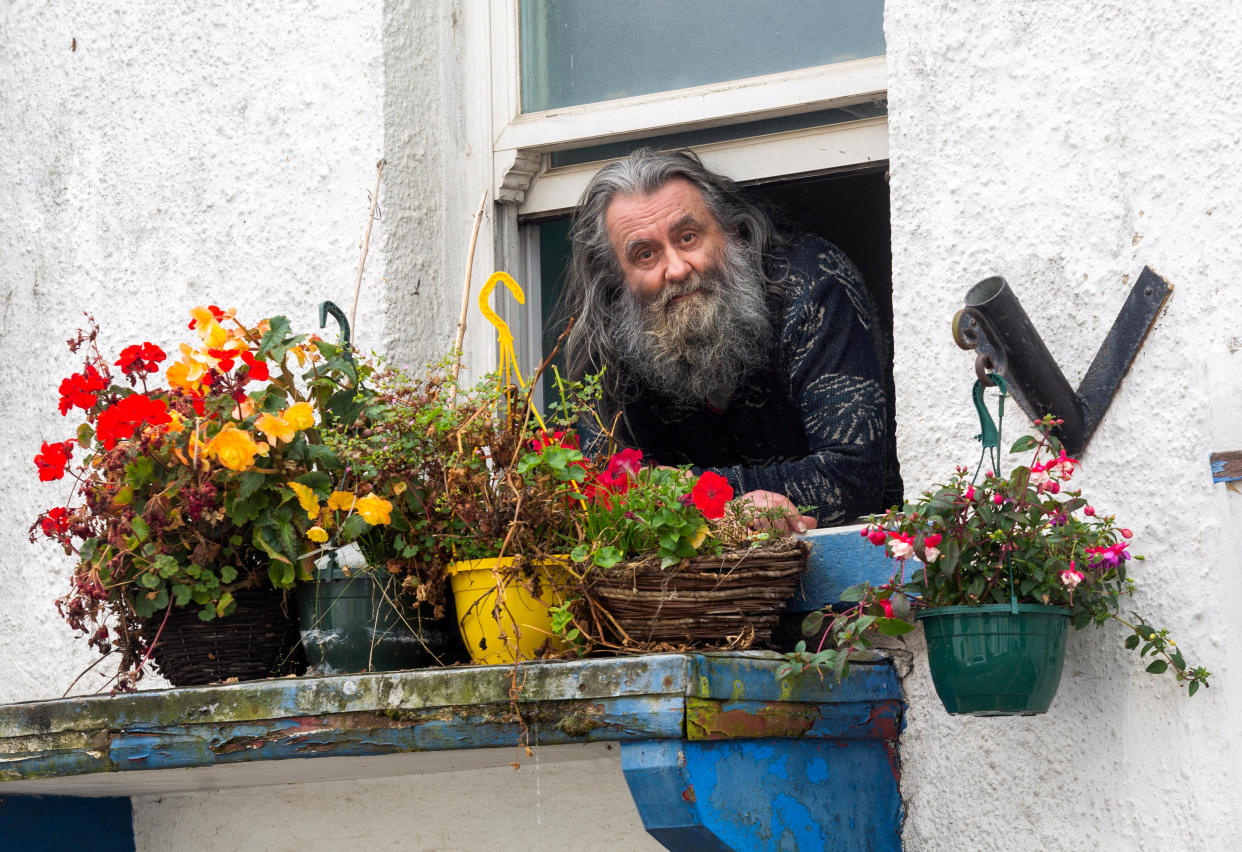 FILE PHOTO  Peter Churcher at his home in Bere Alston, Devon. See SWNS story SWPLsoak; A pensioner has lost his appeal against an assault conviction for soaking a woman with a watering can from his bathroom window. Green-fingered Peter Churcher, 66, claimed he was tendering to his hanging baskets in preparation for an in-bloom contest when 