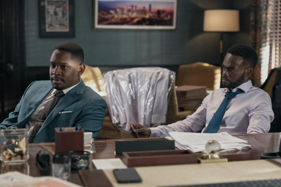 A Man in Full stars Aml Ameen and William Jackson Harper, shown here sitting together by a desk