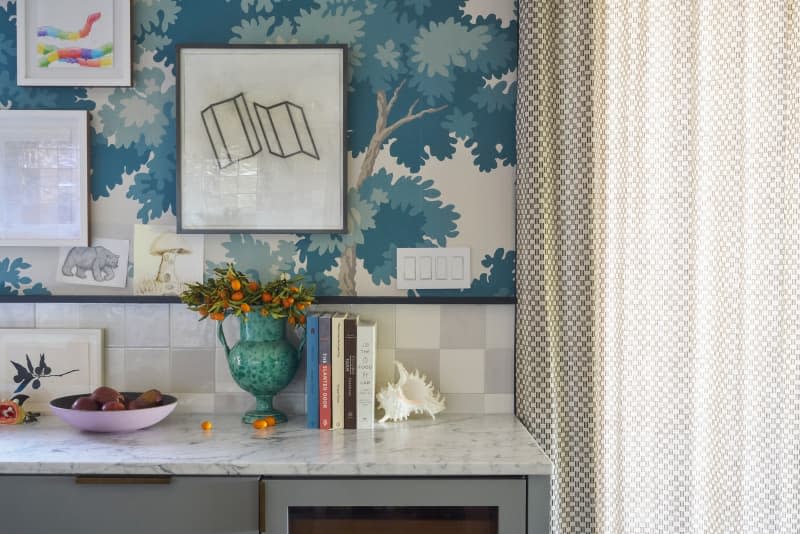 Kumquat arrangement on kitchen countertop.