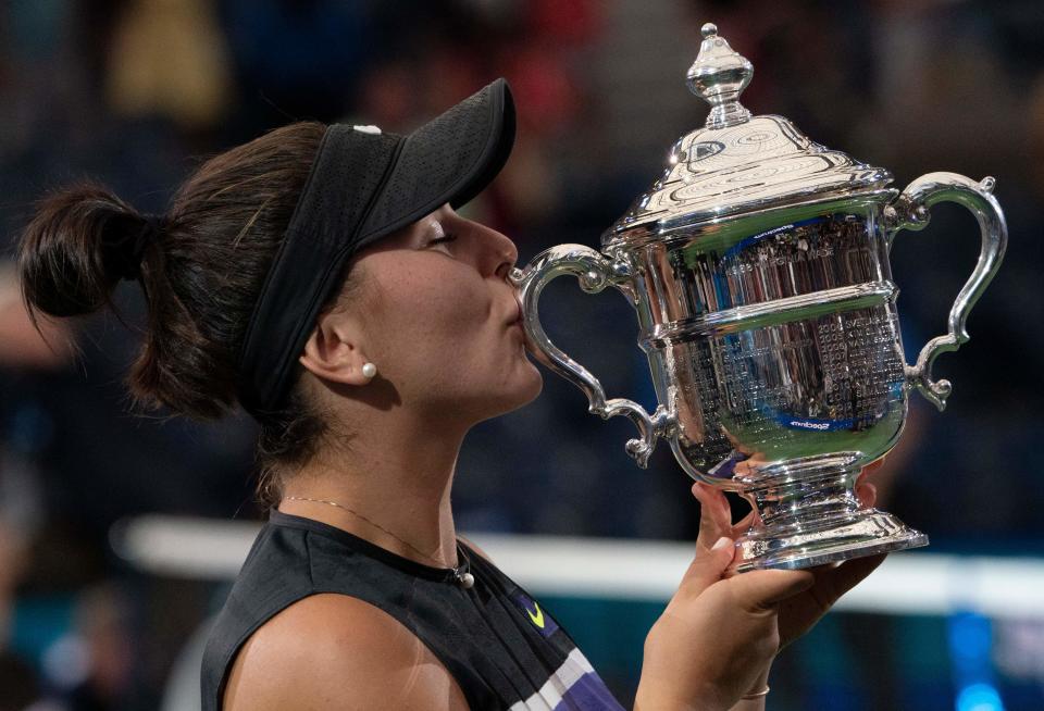 Bianca Andreescu of Canada poses with her trophy after she won against Serena Williams of the US after the Women's Singles Finals match at the 2019 US Open at the USTA Billie Jean King National Tennis Center in New York on September 7, 2019. (Photo by Don Emmert / AFP)        (Photo credit should read DON EMMERT/AFP/Getty Images)