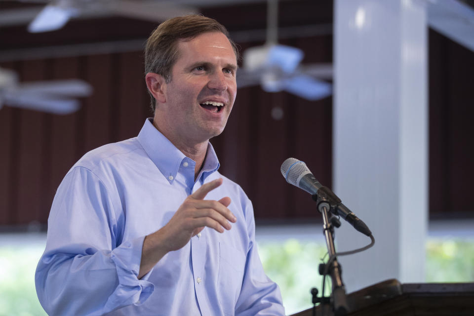 FILE - Kentucky Gov. Andy Beshear speaks during the annual St. Jerome Fancy Farm Picnic in Fancy Farm, Ky., Aug. 5, 2023. Beshear has pushed his opposition to Kentucky's abortion ban to the forefront of his reelection campaign by linking his Republican challenger to an extreme scenario of the strict law — requiring young victims of rape or incest to carry their pregnancies to term. (Ryan C. Hermens/Lexington Herald-Leader via AP, File)