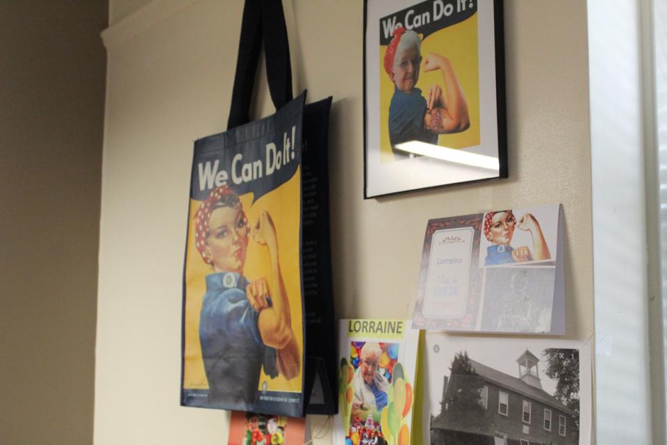 Koons keeps Rosie the Riveter memorabilia on the wall next to the chair where she sits.