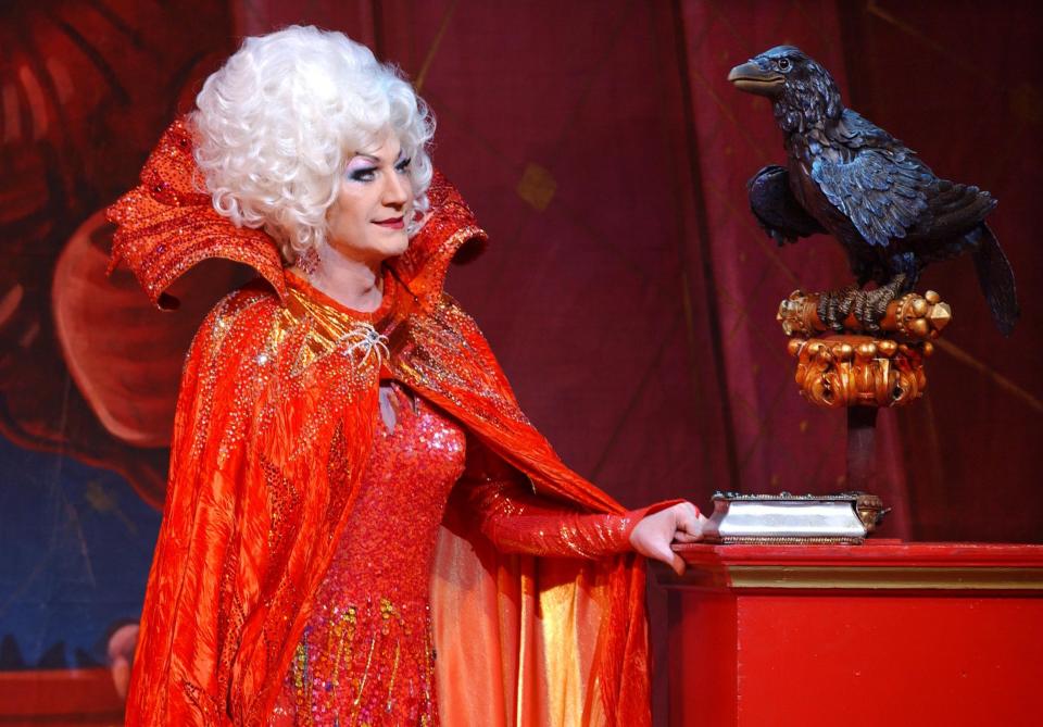 File photo dated 21/12/04 of Paul O'Grady performing as Lily Savage, as the Wicked Queen, in Snow White & The Seven Dwarfs -at the Victoria Palace Theatre, London. TV presenter and comedian Paul O'Grady has died at the age of 67, his partner Andre Portasio has said. The TV star, also known for his drag queen persona Lily Savage, died 