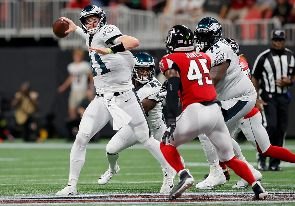 Quarterback Carson Wentz had to get checked for a concussion during Sunday night's game. (Getty Images)