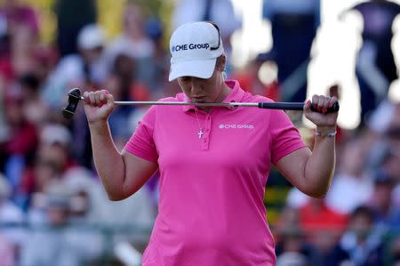 Aug 17, 2014; Pittsford, NY, USA; Brittany Lincicome reacts to missing a putt on the 18th hole resulting to a bogie on the hole to set up a playoff with Inbee Park (not pictured) during the final round of the Wegman's Championship golf tournament at Monroe Golf Club. Mandatory Credit: Mark Konezny-USA TODAY Sports