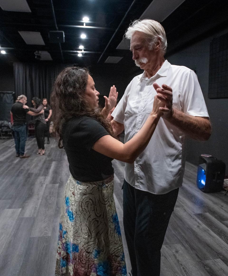PensaTango instructor Belkis Villarral, left, works with Lawrence Melnyk on basic Tango technique during a class at the Gordon Community Art Center on North DeVilliers Street in downtown Pensacola on Monday, Feb. 13, 2023.