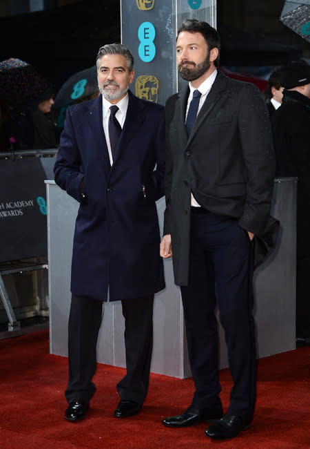 <p>How do you brave the snow and rain? In heavy but stylish jackets. "Argo" producer George Clooney, and director Ben Affleck rugged up for the chilly weather on the BAFTAs red carpet.</p>