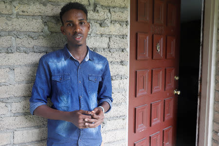 Aden Hussein Hassan poses outside his apartment in Columbus, Ohio, U.S., August 8, 2018. REUTERS/Shannon Stapleton