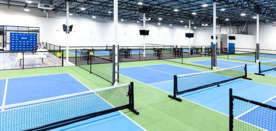 Pickles and Play, featuring seven indoor, professional pickleball courts, will open in January at 7310 Millhouse Road in Chapel Hill.