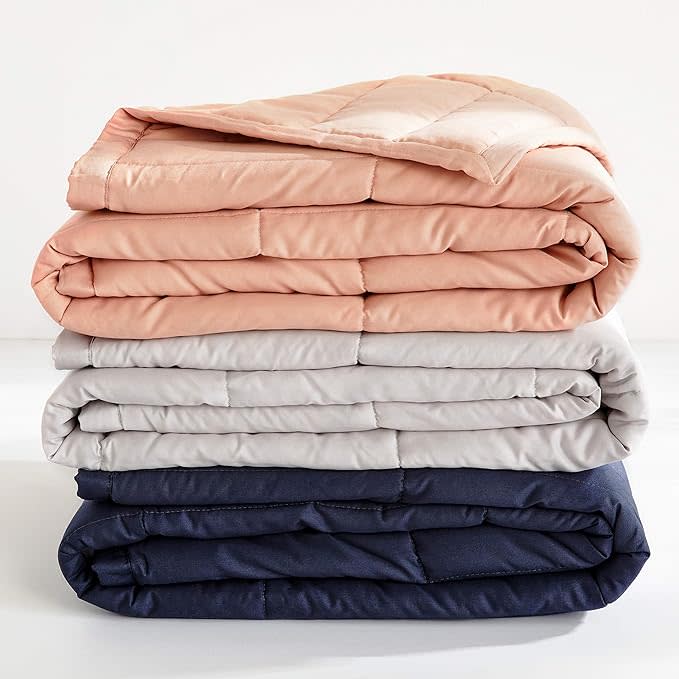 pink, gray and navy blue casper weighted blanket