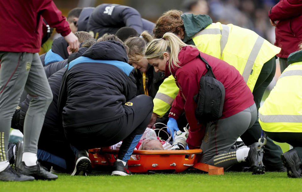 Arsenal's Frida Maanum receives medical attention after she goes down during the FA Women's Continental Tyres League Cup Final at Molineux Stadium, Wolverhampton, England, Sunday March 31, 2024. (David Davies/PA via AP)