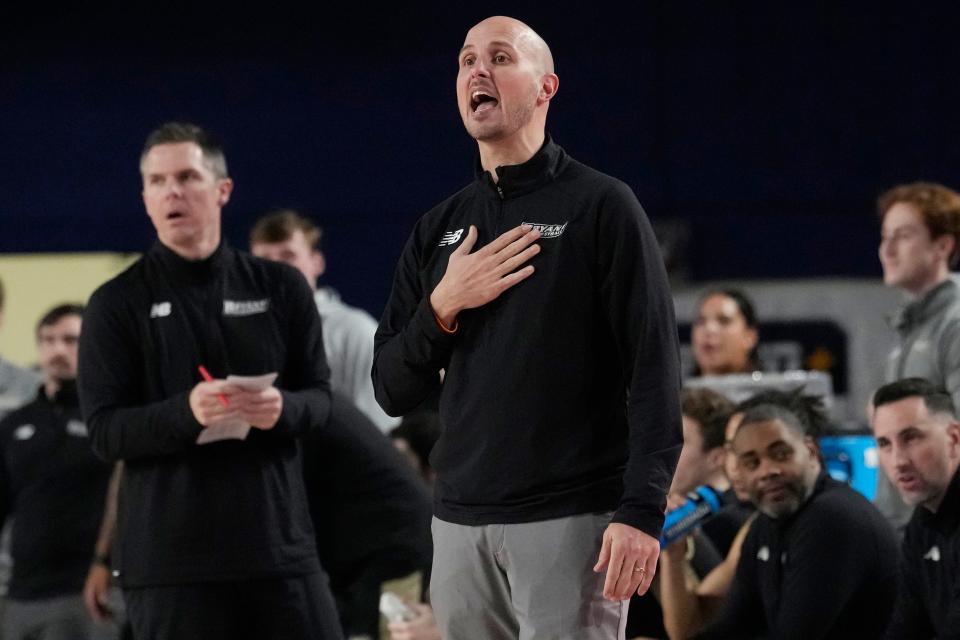 Bryant University head coach Phil Martelli Jr. gestures during Saturday's game against Florida Atlantic.