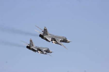 An U.S. Navy picture shows what appears to be two Russian Sukhoi SU-24 attack aircraft flying over the U.S. guided missile destroyer USS Donald Cook in the Baltic Sea in this picture taken April 12, 2016 and released April 13, 2016. REUTERS/US Navy/Handout via Reuters