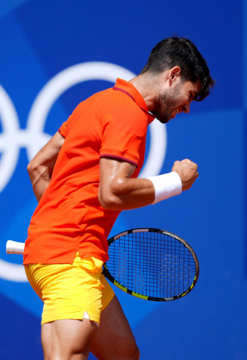 Aug 2, 2024; Paris, France; Carlos Alcaraz (ESP) reacts after a point against Felix Auger-Aliassime (not pictured) during the Paris 2024 Olympic Summer Games at Stade Roland Garros. Mandatory Credit: Amber Searls-USA TODAY Sports