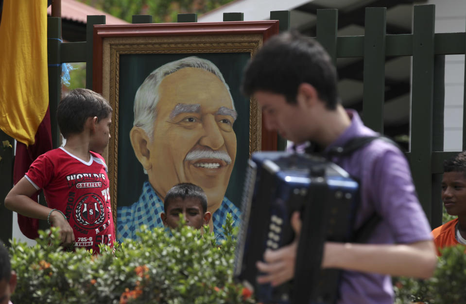 An accordionist plays a vallenato tune in front of the Gabriel Garcia Marquez Museum during a symbolic funeral ceremony in front of the home were he was born in Aracataca, in Colombia's Caribbean coast, Monday, April 21, 2014. Colombian Nobel Literature laureate Garcia Marquez died at the age of 87 in Mexico City on April 17, 2014. (AP Photo/Ricardo Mazalan)