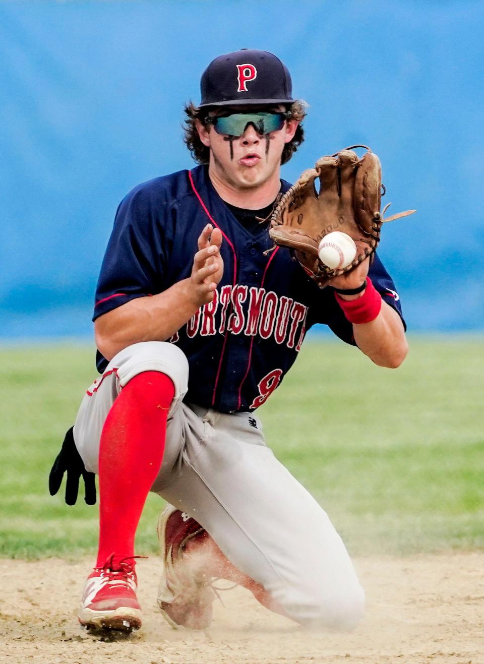 Portsmouth shortstop John Mass makes a play on a ground ball during a game against Cumberland in 2022.