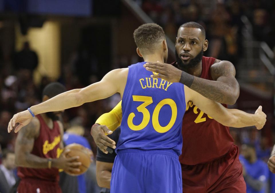 Stephen Curry's Warriors and LeBron James' Cavaliers will face off in the NBA Finals for the third straight year. (AP)