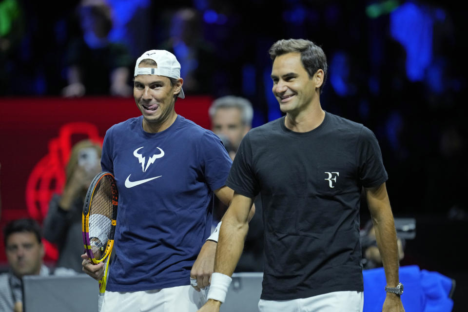 Switzerland's Roger Federer, right, and Spain's Rafael Nadal attend a training session ahead of the Laver Cup tennis tournament at the O2 in London, Thursday, Sept. 22, 2022. (AP Photo/Kin Cheung)