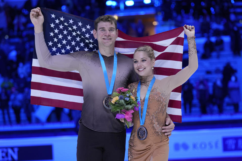 Second place, United States' Alexa Knierim and Brandon Frazier, pose after the Pairs Free Skating event during the figure skating Grand Prix finals at the Palavela ice arena, in Turin, Italy, Friday, Dec. 9, 2022. (AP Photo/Antonio Calanni)