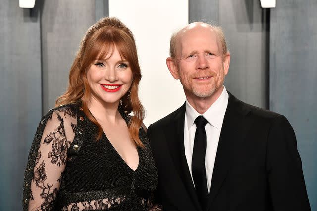 <p>Frazer Harrison/Getty</p> Bryce Dallas Howard and Ron Howard