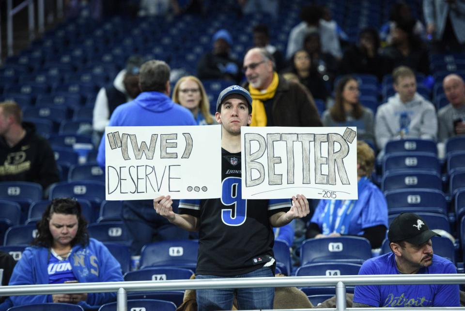 Detroit Lions fan holds up a sign before the game against the Tampa Bay Buccaneers at Ford Field, Dec. 15, 2019.