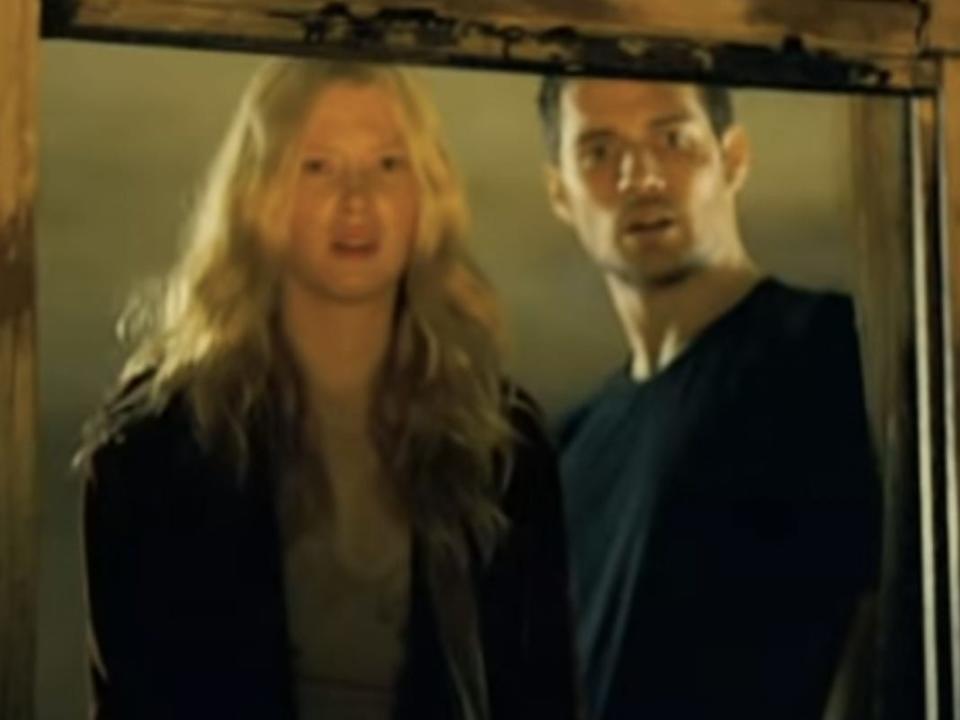 Emma Booth and Henry Cavill in "Blood Creek."