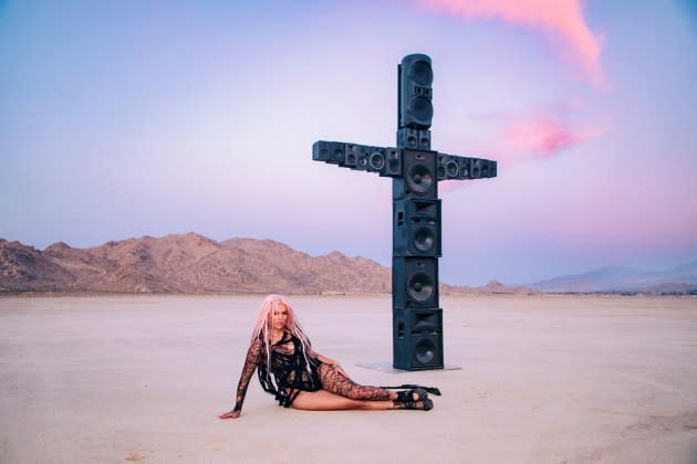 Karol G Races Through The Desert In Video For 'S91