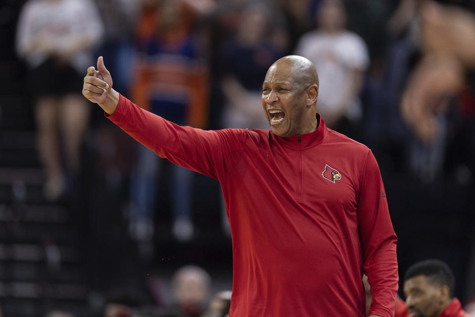 FILE - Louisville head coach Kenny Payne yells to his players during the first half of an NCAA college basketball game against Virginia in Charlottesville, Va., Saturday, March 4, 2023. historically bad season left Louisville with nowhere to go but up. Second-year coach Kenny Payne took major step in that direction by landing a top-10 recruiting class. (AP Photo/Mike Kropf, FIle)