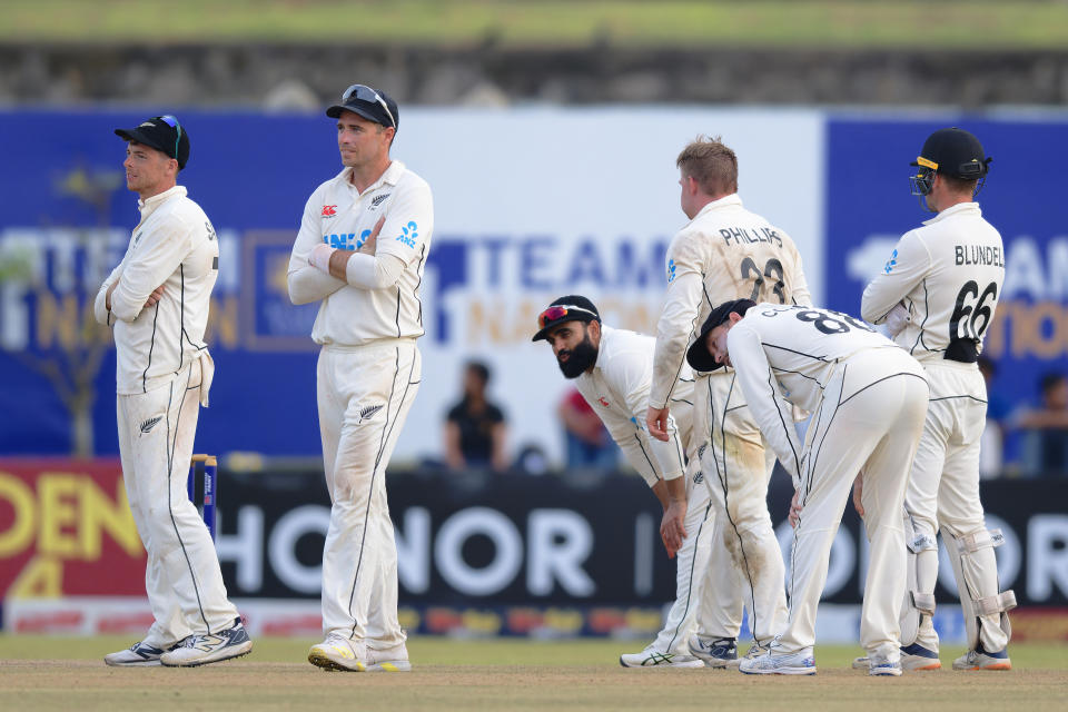 New Zealand's players react after the third umpire's decision went against their review on the third day of the first cricket test match between New Zealand and Sri Lanka in Galle, Sri Lanka, Friday, Sept. 20, 2024. (AP Photo/Viraj Kothalawala)