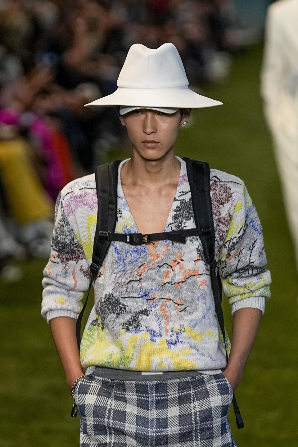A model wears a creation as part of the Dior men's Spring Summer 2023 collection presented in Paris, France, Friday, June 24, 2022. (AP Photo/Michel Euler)
