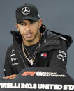 Mercedes driver Lewis Hamilton, of Britain, speaks during a news conference for the Formula One U.S. Grand Prix auto race at the Circuit of the Americas, Thursday, Oct. 18, 2018, in Austin, Texas. (AP Photo/Darren Abate)