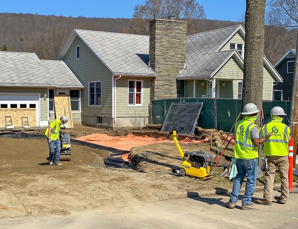 A cleanup team works to remediate a property in the Houghton Plot study area in 2021. The work in Corning, which is continuing this year, is geared to eliminate potential exposure to contaminants including arsenic, cadmium, lead and semi-volatile organic compounds.