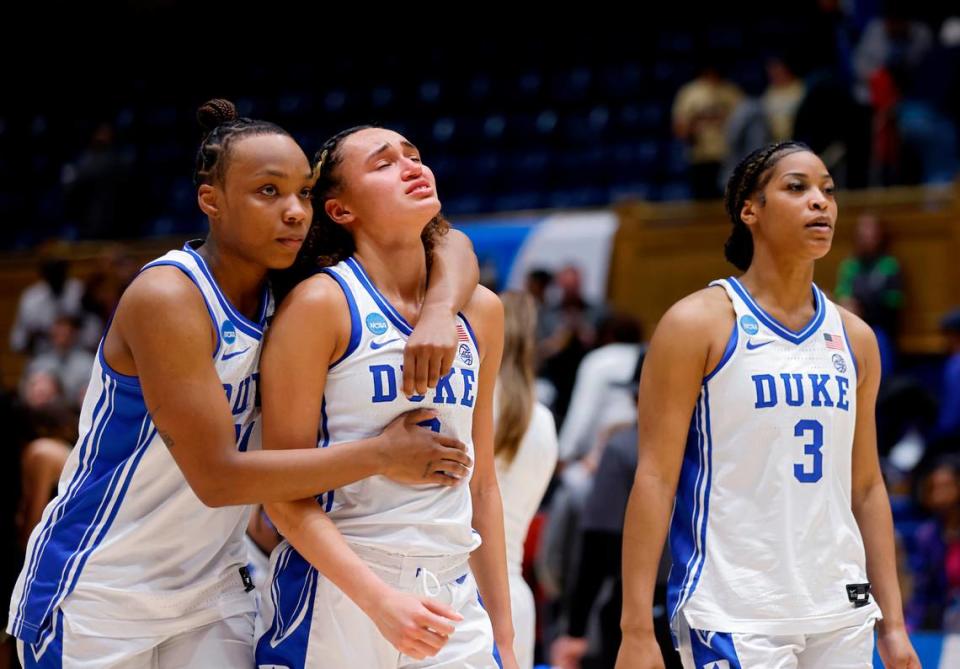 Duke’s Jordyn Oliver, Celeste Taylor and Ashlon Jackson walk off the court following the Blue Devils’ 61-53 loss to Colorado in an NCAA Tournament second round game at Cameron Indoor Stadium on Monday, March 20, 2023, in Durham, N.C.
