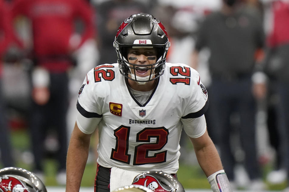 Tampa Bay Buccaneers quarterback Tom Brady (12) calls a play at the line of scrimmage against the New Orleans Saints during the second half of an NFL divisional round playoff football game, Sunday, Jan. 17, 2021, in New Orleans. (AP Photo/Brynn Anderson)