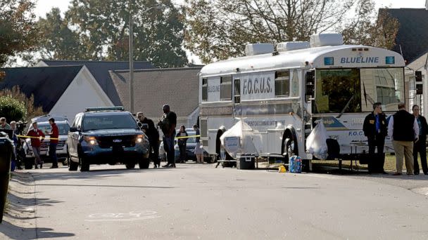 PHOTO: Police on the scene at Castle Pines Dr. and Sahalee Way, Oct. 14, 2022, following a shooting the night before in Raleigh, N.C. (Chris Seward/AP)