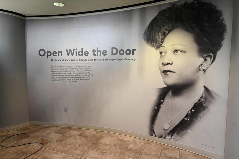 A photo of Mary Caldwell Dawson welcomes visitors at the entrance of the new Charlotte Museum of History exhibit “Open Wide the Door.” The exhibit tells the story of Dawson, an N.C. native who formed the first commercially successful Black opera company in the U.S.