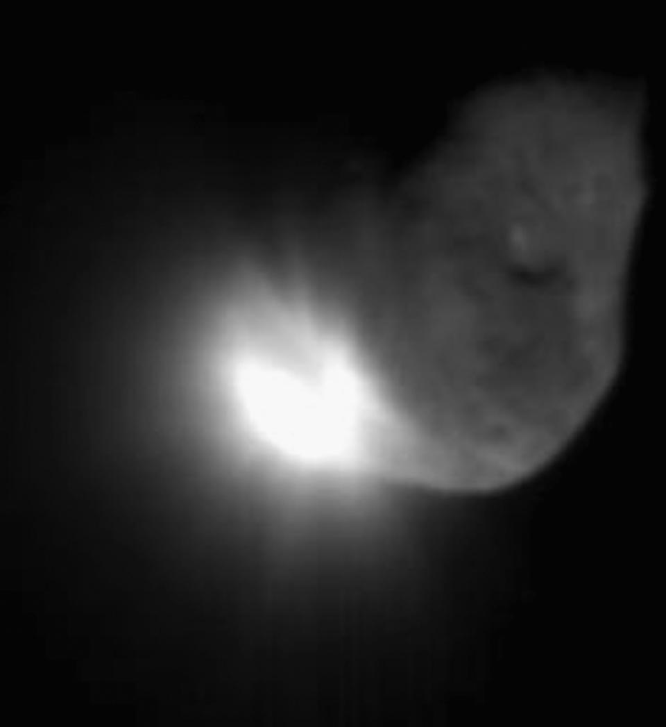 IN SPACE - JULY 4:  This handout image from NASA shows the initial ejecta that resulted when NASA's Deep Impact probe collided with comet Tempel 1 at 01:52 EST on July 4, 2005. The image was taken by the spacecraft's medium-resolution camera 16 seconds after impact. (Photo by NASA/JPL-Caltech/UMD via Getty Images)