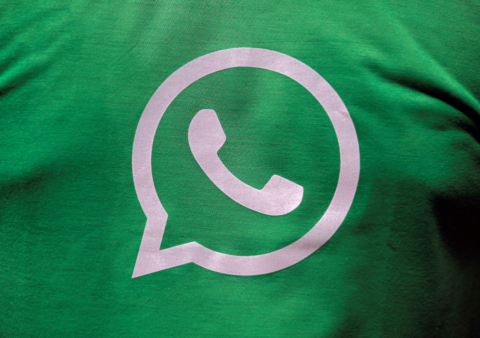 A logo of WhatsApp is pictured on a T-shirt worn by a WhatsApp-Reliance Jio representative during a drive by the two companies to educate users, on the outskirts of Kolkata, India, October 9, 2018. Picture taken October 9, 2018. REUTERS/Rupak De Chowdhuri