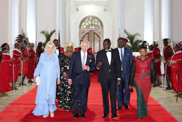 <p>Chris Jackson/Getty </p> Queen Camilla, King Charles III, William Ruto, President of the Republic of Kenya, and Rachel Ruto, First Lady of the Republic of Kenya enter State House for a State Banquet on October 31.