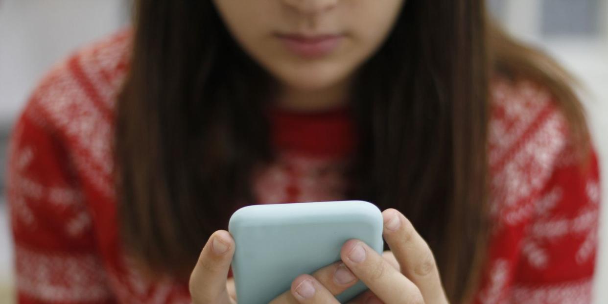 young woman using smart phone