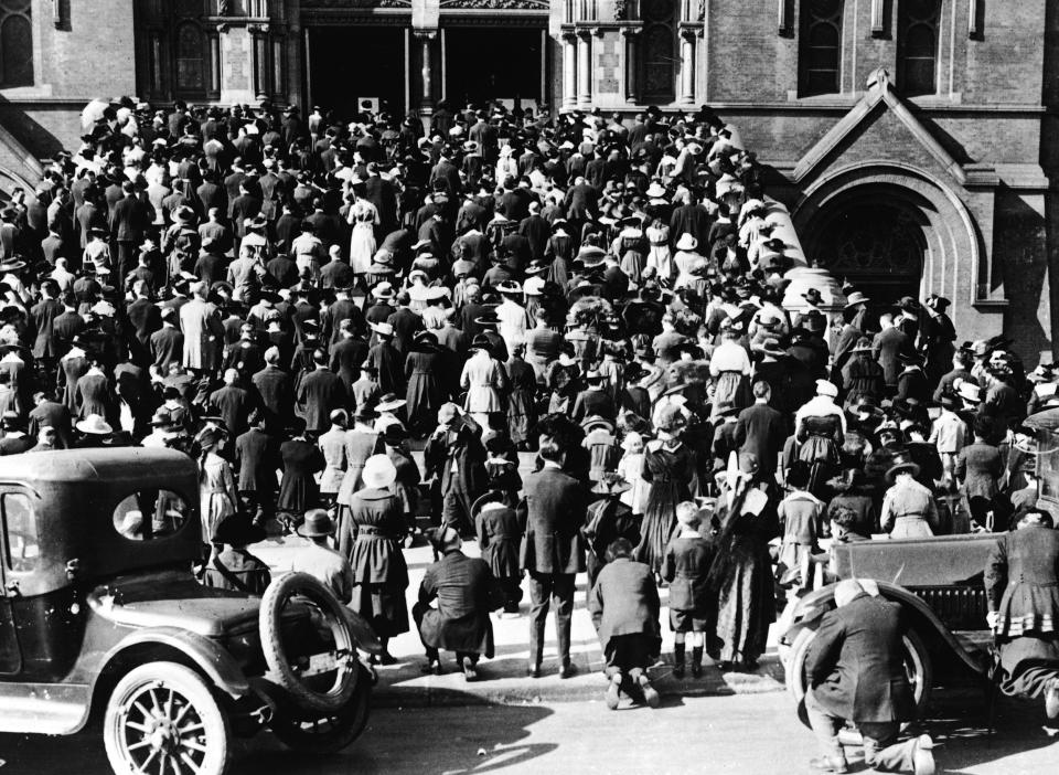 Image: Praying for Health During Flu Epidemic (Hulton Archive / Getty Images file)