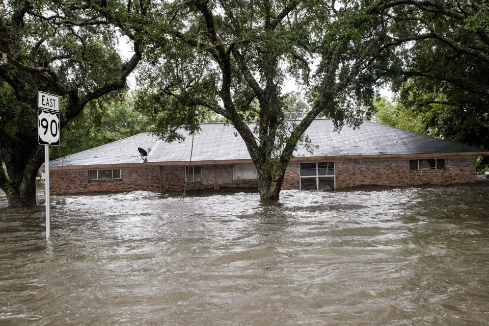 A home is deluged&nbsp;near Nome, Texas. (Photo: Joseph Rushmore for HuffPost)