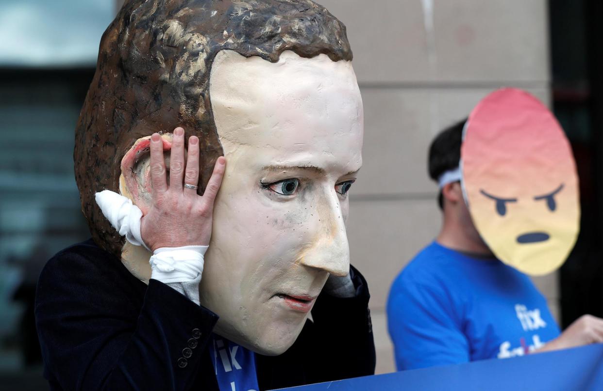 Protesters from the pressure group Avaaz demonstrate against Facebook outside Portcullis House in Westminster: REUTERS/Peter Nicholls