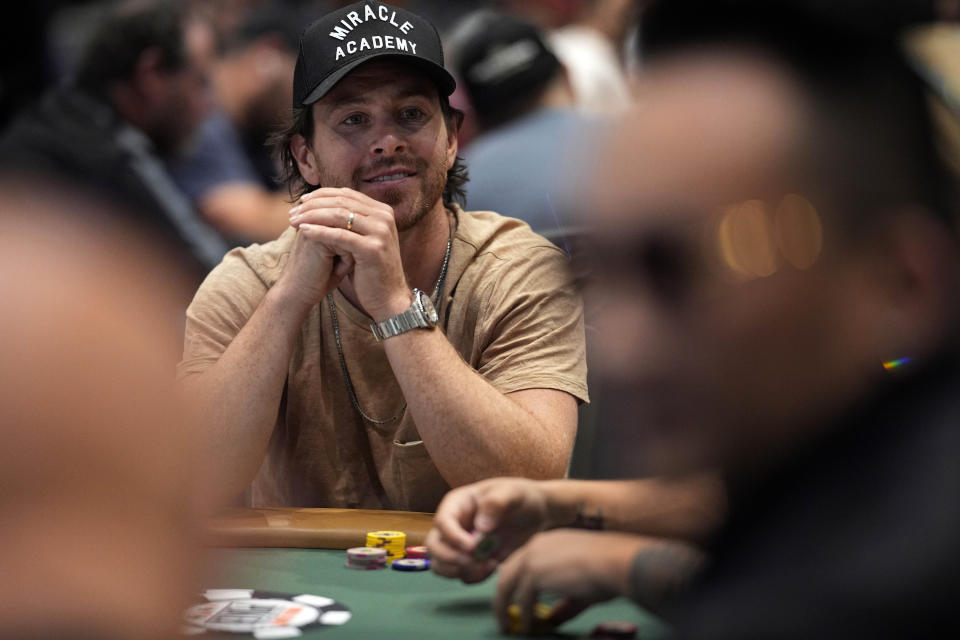 Vegas Golden Knights right wing Jonathan Marchessault plays poker during the $5,000 Champions Reunion No-Limit Hold'em Freezeout event at the World Series of Poker, Tuesday, May 28, 2024, in Las Vegas. (AP Photo/John Locher)