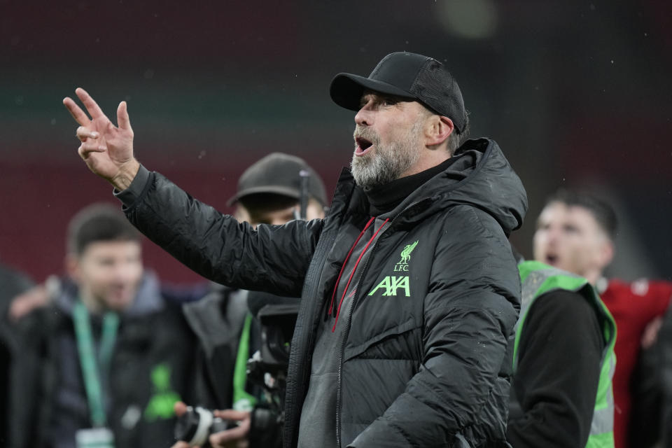 Liverpool's manager Jurgen Klopp celebrates after his team won the English League Cup final soccer match between Chelsea and Liverpool at Wembley Stadium in London, Sunday, Feb. 25, 2024. (AP Photo/Alastair Grant)