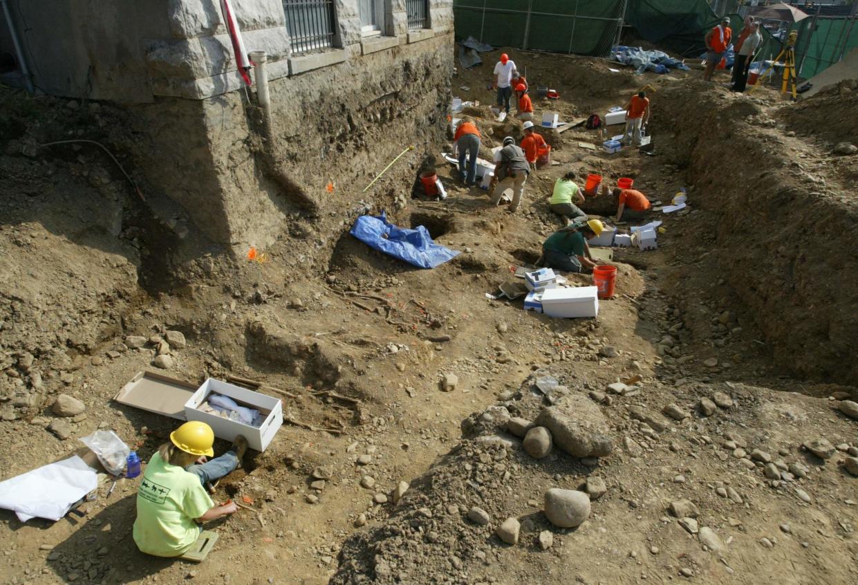 A crew of archeologists in 2008 unearth the remains of hundreds of black men, women and children buried under a site that would become the Newburgh City Courthouse.